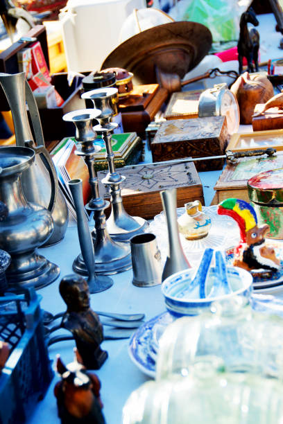 An image from the colorful Marché d'Aligre Flea Market in Paris' 12th arrondissement showing goods for sale on an outdoor table