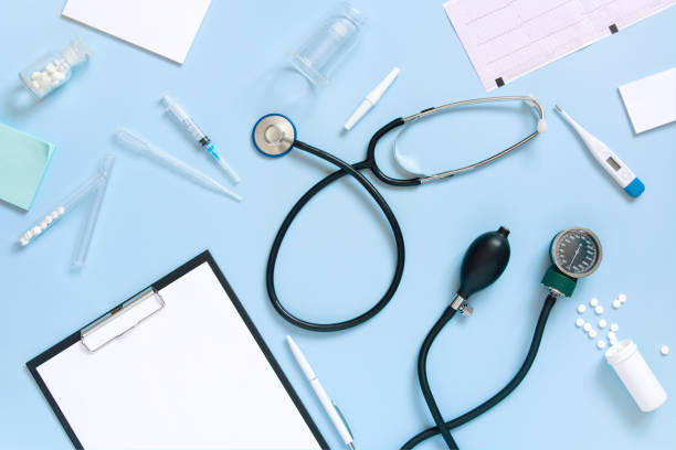 istock Blue medical pattern with clipboard and stethoscope 1133637776