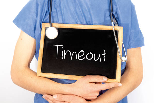 istock Doctor shows information on blackboard: timeout.  Medical concept. 1133638037
