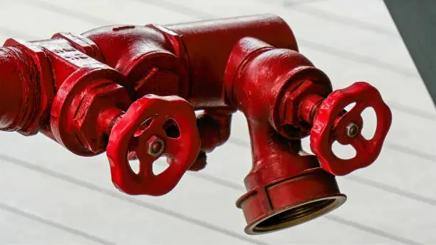 A red water pump for firetrucks on the expo in Italy. The red water pipe pump will be used for firetrcuks in case of fire