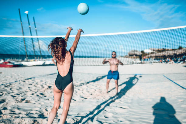 istock Cute Couple Playing Beach Volleyball In Cuba 1133639837