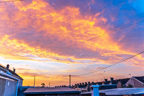 Red sunrise over urban housing