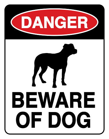 Vector illustration of a beware of dog sign.