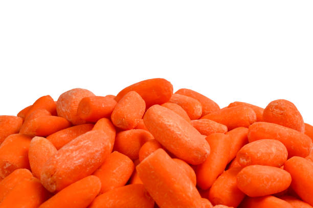 istock Little fresh carrots as a background. Snack. 1133641402