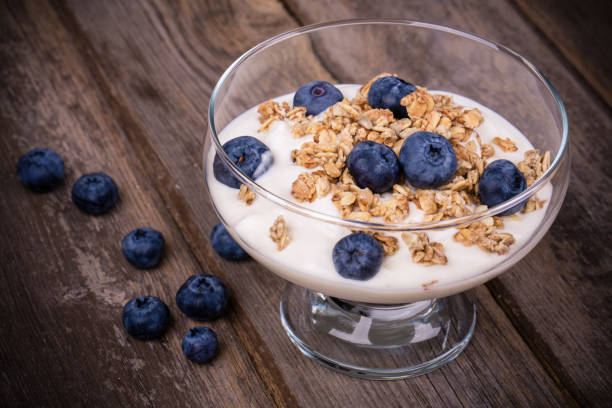 istock Yogurt with granola and blueberries. 1133641561