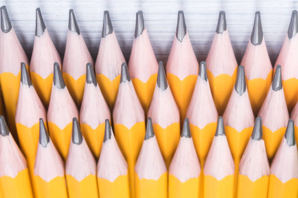 Yellow pencil on a white background