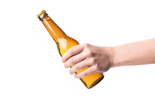 Hand Holding Beer Bottle isolated on white