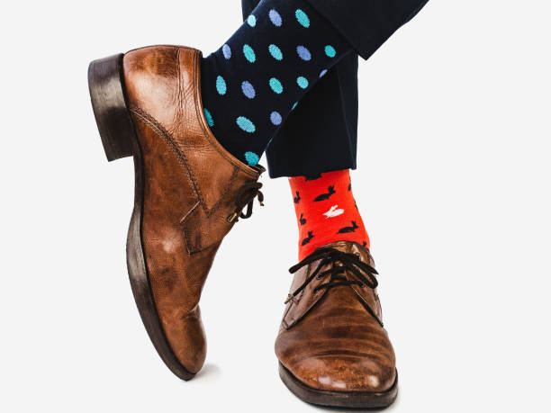 office manager in stylish shoes and bright socks - business human foot shoe men imagens e fotografias de stock