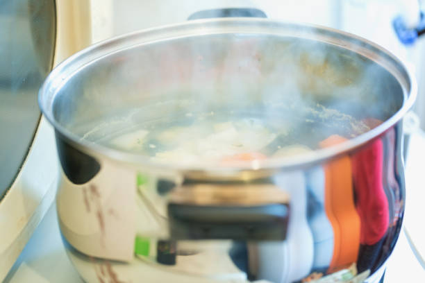 istock Broccoli cream soup preparing, veggies boiled, close-up 1133645067