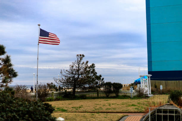 istock United States flag on the beach 1133645271