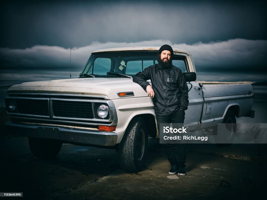 Serious Man And 50 Year Old Truck Stock Photo - Download Image Now -  Pick-up Truck, Dusk, Men - iStock