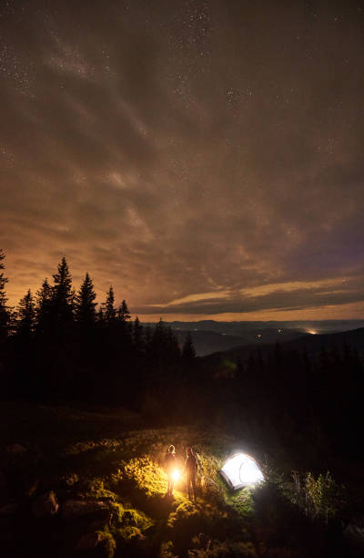 istock Night summer camping in the mountains under night starry sky 1133646667