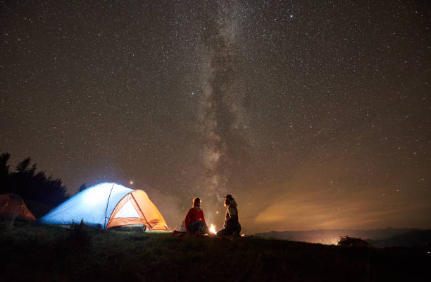 istock Night summer camping in the mountains under night starry sky 1133646671
