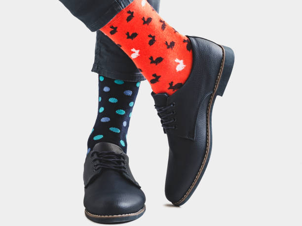 Men's legs, trendy shoes and bright socks