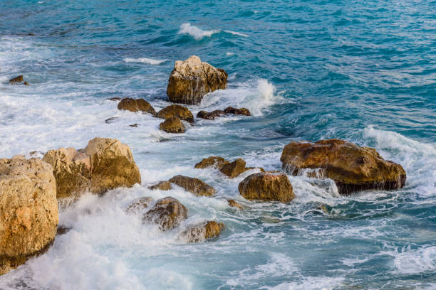 istock Picturesque rocky shore with waves 1133649861