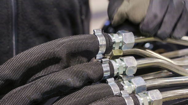 istock The hydraulic hose being locked by the screw 1133650028
