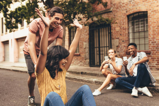 istock Friends creating new social media content 1133651107