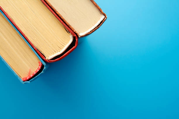 istock Old and used hardback books or text books seen from above. 1133651706