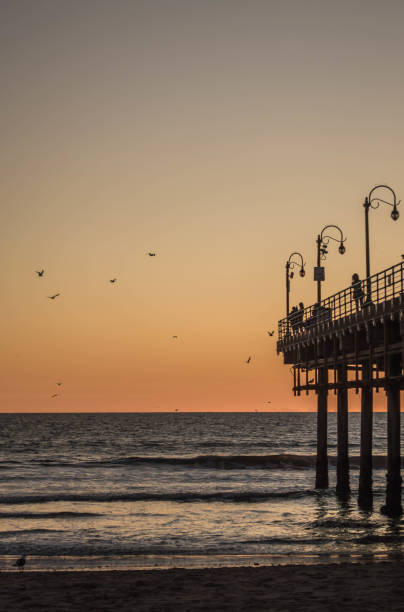 istock Sunset over the Pacific Ocean in Santa Monica, CA 1133653844