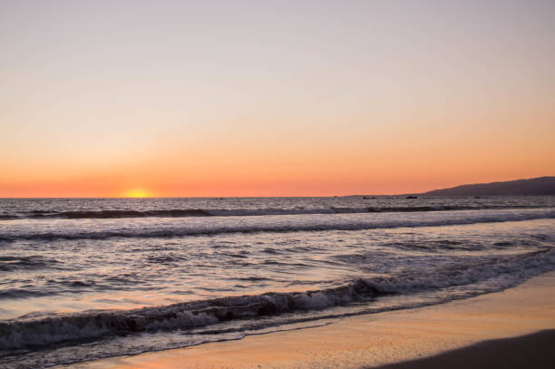 istock Sunset over the Pacific Ocean in Santa Monica, CA 1133653947