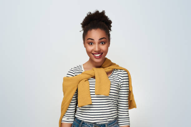 istock Young woman studio isolated in white smiling toothy 1133655403