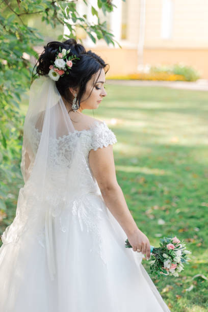 istock Beautiful bride in a gorgeous dress and bouquet 1133657255
