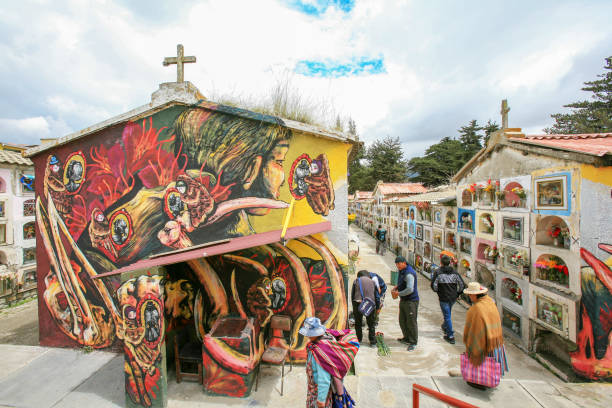 people in the cementerio general (main cemetery) of la paz during new year's eve, bolivia. - people cemetery church urban scene imagens e fotografias de stock