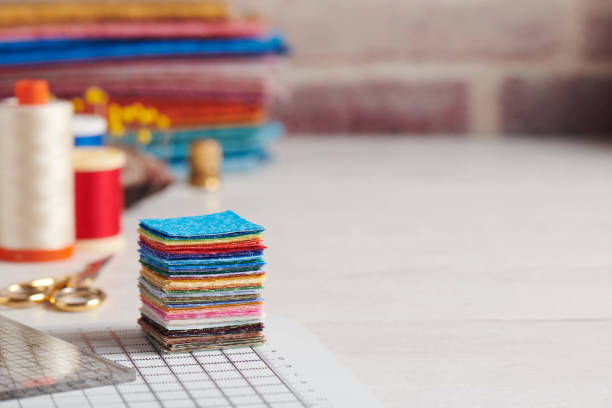 istock Stack of square pieces of colorful fabrics, accessories for quilting 1133664034