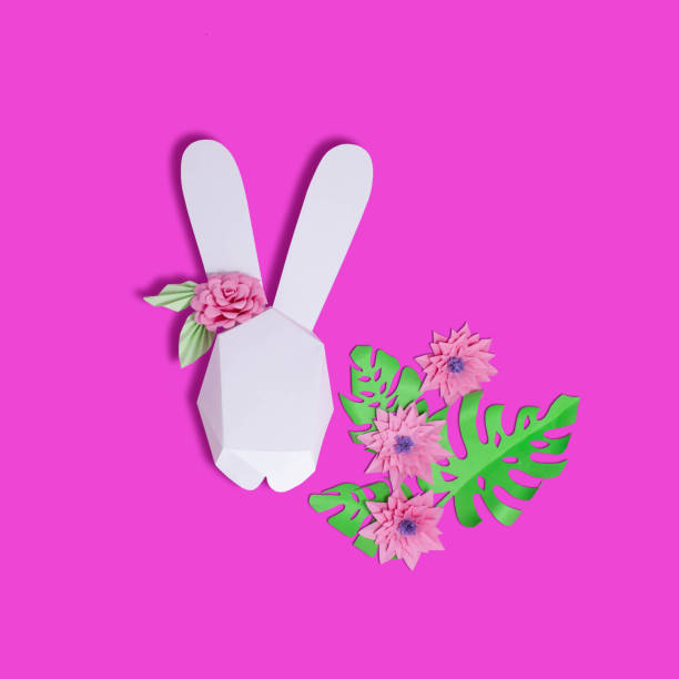 istock Easter paper decor. 3D Easter bunny and flowers 1133664213