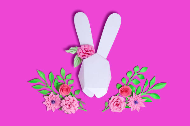 istock Easter paper decor. 3D Easter bunny and flowers 1133664215