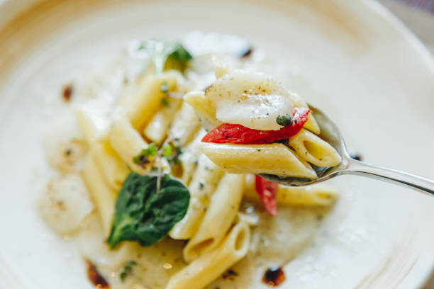 Scallops with truffle cream sauce