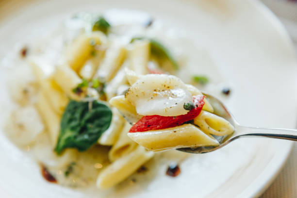 Scallops with truffle cream sauce