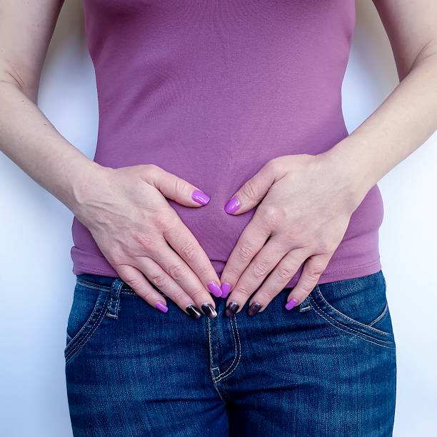istock woman abdominal pain symptom 1133668343