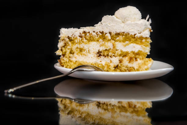 istock Piece of tasty cake on plate with reflection 1133669751