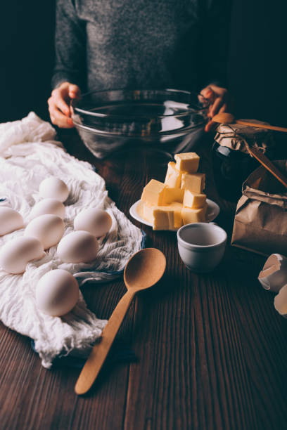 istock Young woman prepares homemade cake 1133671430