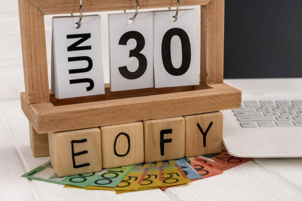 istock Australian dollars and wooden calendar with cubes EOFY 1133672174