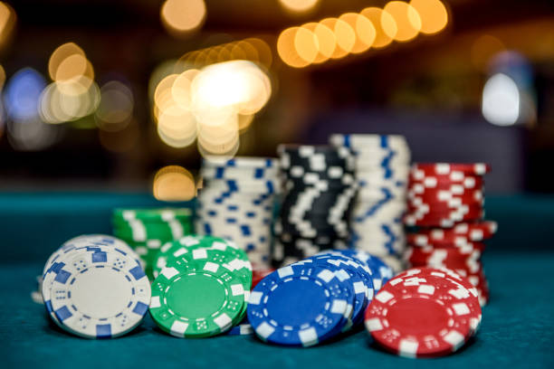 istock Macro photo of casino chips on table 1133672355