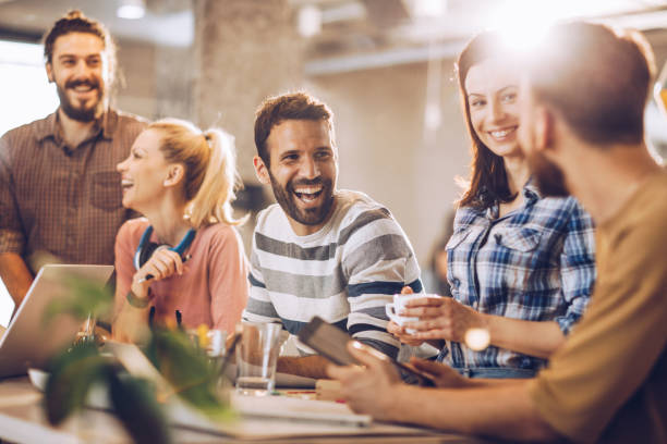 istock Team of creative people working at casual office. 1133672381