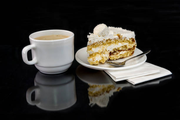 istock Piece of tasty cake and coffee with reflection 1133672452