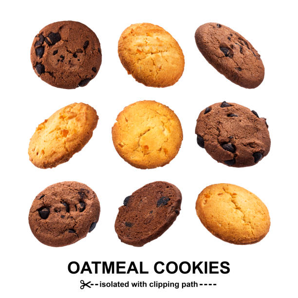 galletas de avena aisladas sobre fondo blanco - nobody cookie oat close up fotografías e imágenes de stock