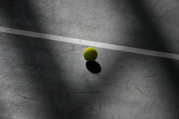 istock tennis ball on a field 1133673590