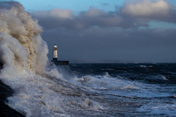istock Storm Freya lashes Porthcawl lighthouse 1133677801