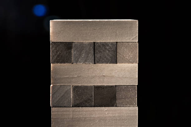 multistory tower of wooden blocks. jenga game. Horizontal frame
