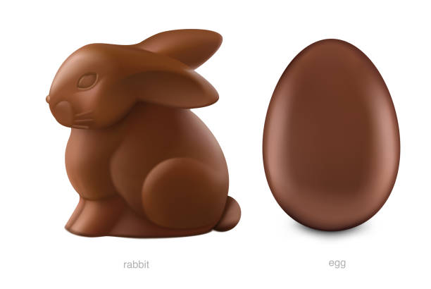 チョコレートイースターバニーと白い背景に分離チョコレートエッグ。 - animal brown cute easter点のイラスト素材／クリップアート素材／マンガ素材／アイコン素材