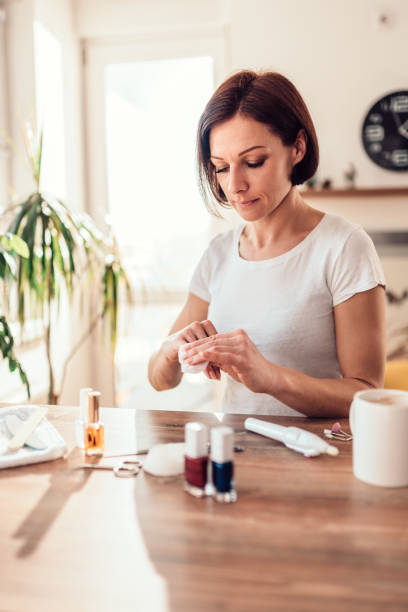 istock Woman removing nail polish 1133679118