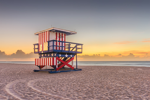 Miami Beach, Florida, USA sunrise and life guard tower.