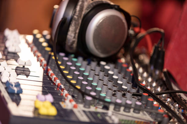 istock Headphone and sound mixer, sound studio equipment 1133682979