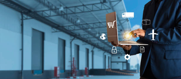 istock Businessman manager using laptop check orders online goods worldwide for network with Modern Trade warehouse logistics. Industry of logistics network concept. 1133683159