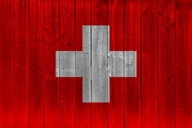 istock Switzerland flag painted on old wood plank 1133688709