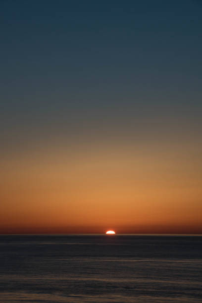 istock Beautiful sunset in a quiet sea 1133689596